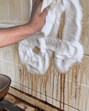 Oil splashes off the kitchen tiles